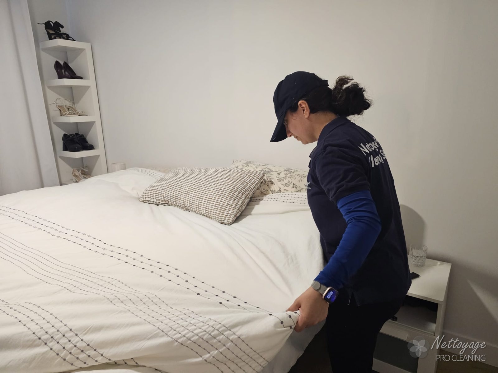 Freshly made bed in a clean bedroom