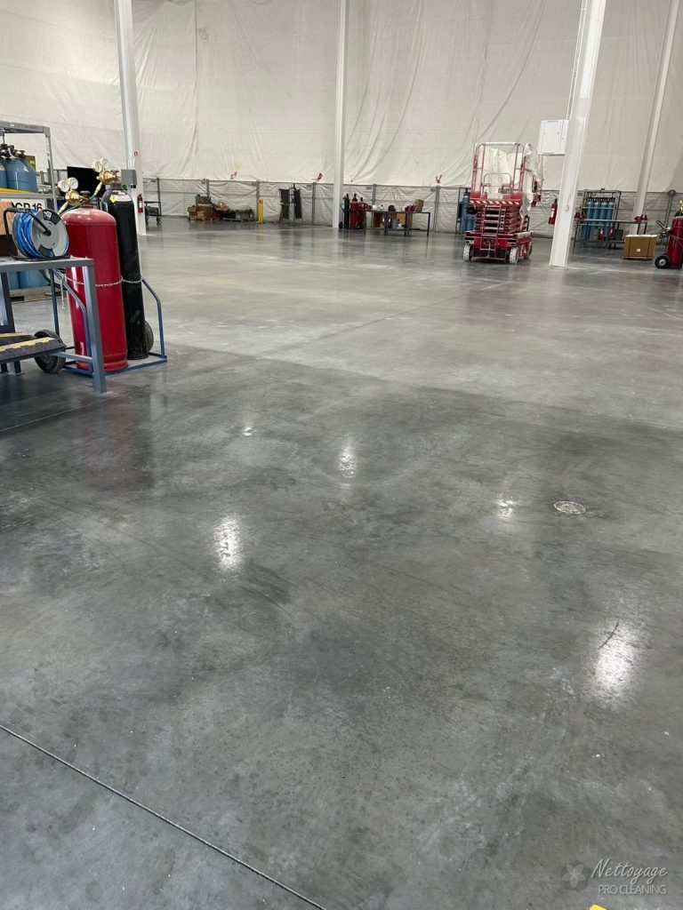 Polished concrete warehouse floor after post construction cleaning