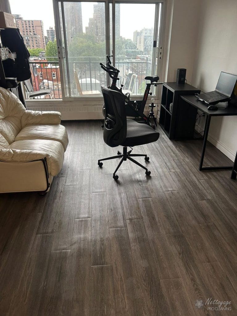 Clean living room with city view after deep cleaning